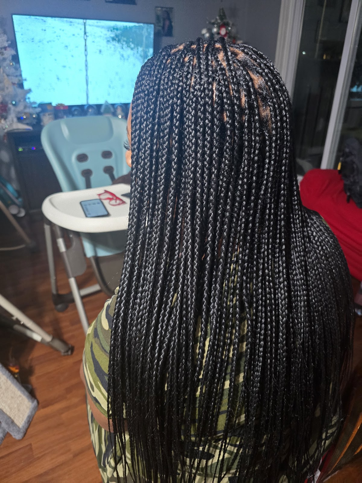 Long knotless box braids, back view showing neat parting